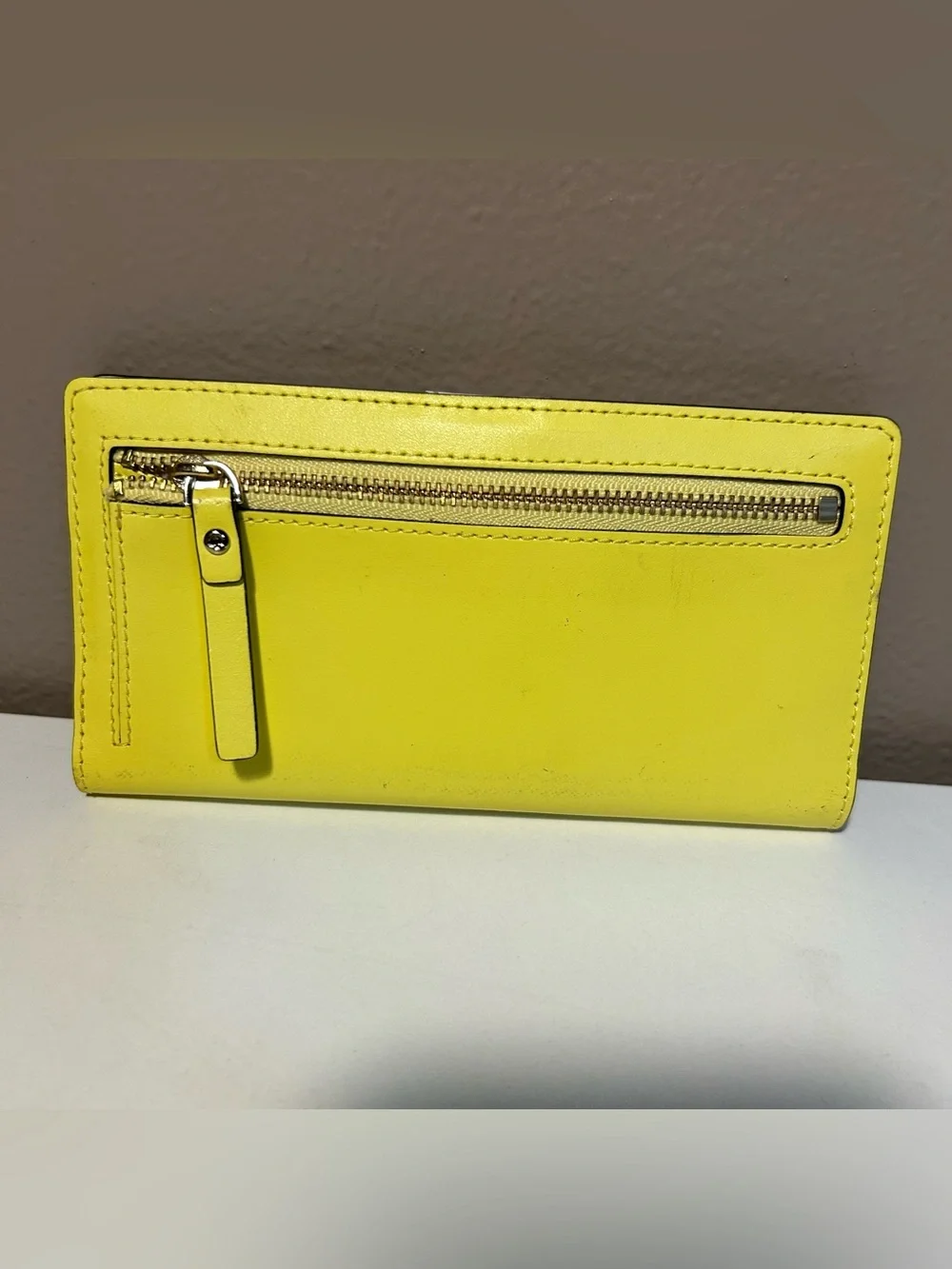 kate spade Yellow Leather Slim Bifold Wallet